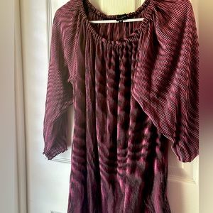 Pink and black striped top. Wavy looking.